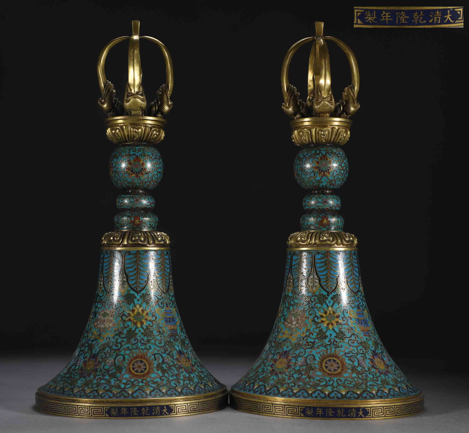 A Pair of Rare Cloisonne Lotus and Eight Treasures Pattern Bell Ornaments: A Pair of Rare Cloisonne Lotus and Eight Treasures Pattern Bell Ornaments,Qing Dynasty,China,Qianlong Six-character Mark,Size:15.4inx7.6in,Total Weight:4300g一对景泰蓝