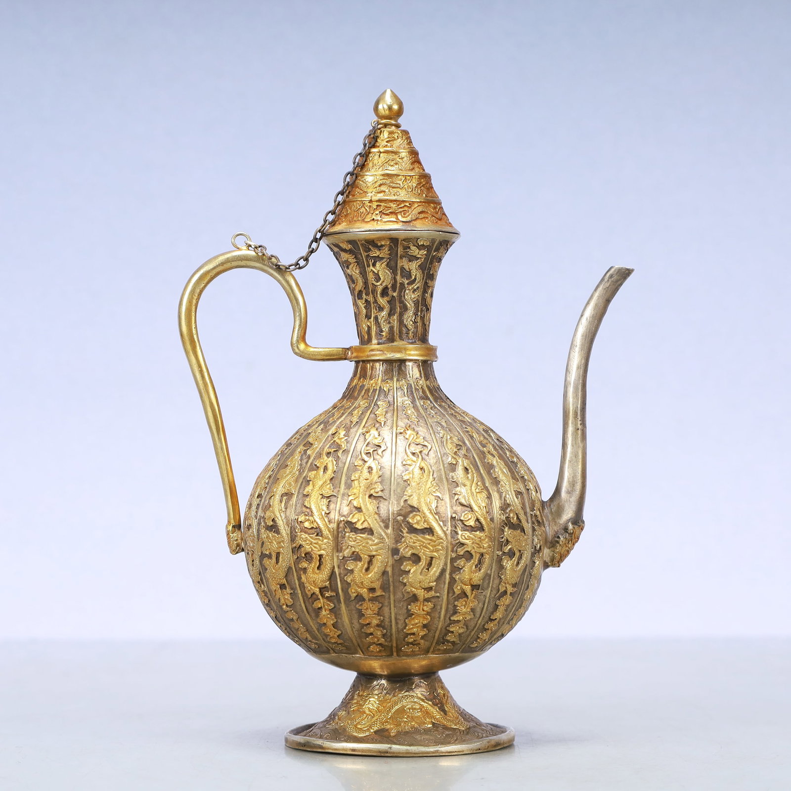 A Exquisite Gilt Silver Dragon Pattern Ewer: A Exquisite Gilt Silver Dragon Pattern Ewer Tang Dynasty, China Zhenguan Four-character Mark Size:6.3inx4.3inx8.9in Weight:750g铜鎏金银龙纹执壶