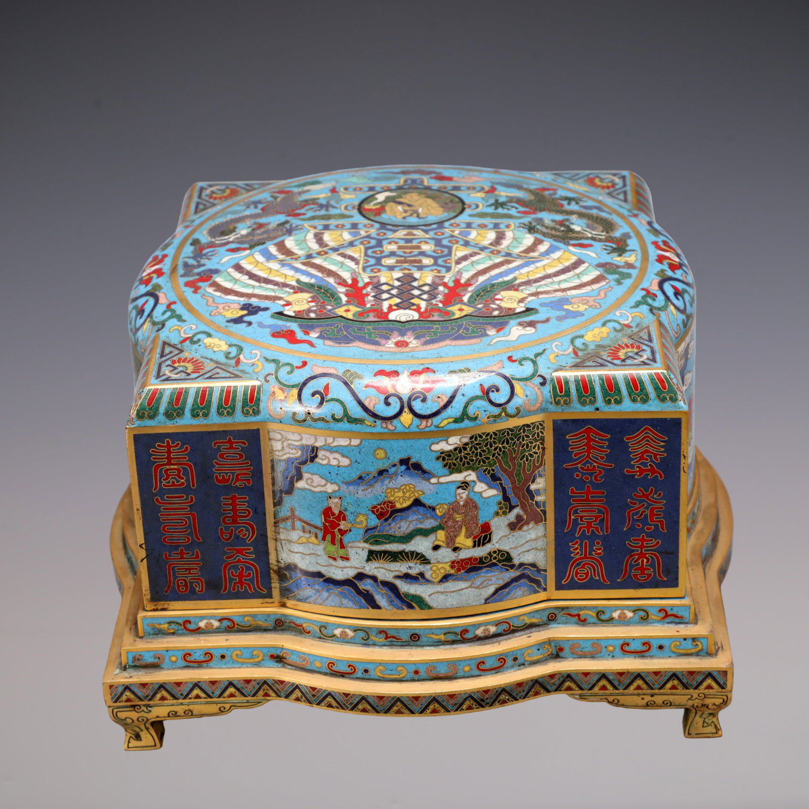 A Exquisite Cloisonne Lotus Pattern Character and Story Pattern Dragon Pattern Box: A Exquisite Cloisonne Lotus Pattern Character and Story Pattern Dragon Pattern Box Qing Dynasty, China Qianlong Six-character Mark Size:10.8inx10.8inx6.7in Weight:5900g景泰蓝缠