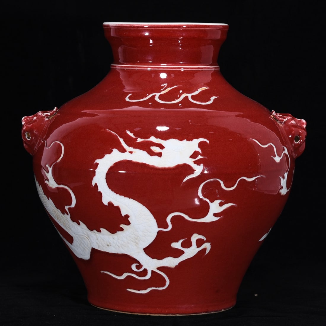 A Rare Ji Red Glazed Dragon Pattern Beast-Ears Jar: A Rare Ji Red Glazed Dragon Pattern Beast-Ears Jar,Yuan Dynasty, China,Size:13.4inx13.8in霁红釉龙纹兽耳罐,中国元代,Size:34cmx35c