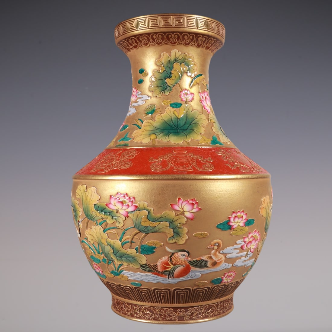 An Exquisite Enamel Gold Ground Flower and Bird Pattern Vase: An Exquisite Enamel Gold Ground Flower and Bird Pattern Vase,Qing Dynasty, China,Qianlong Six-character Mark,Size:11.4inx7.9in珐琅彩金地花鸟纹瓶,&