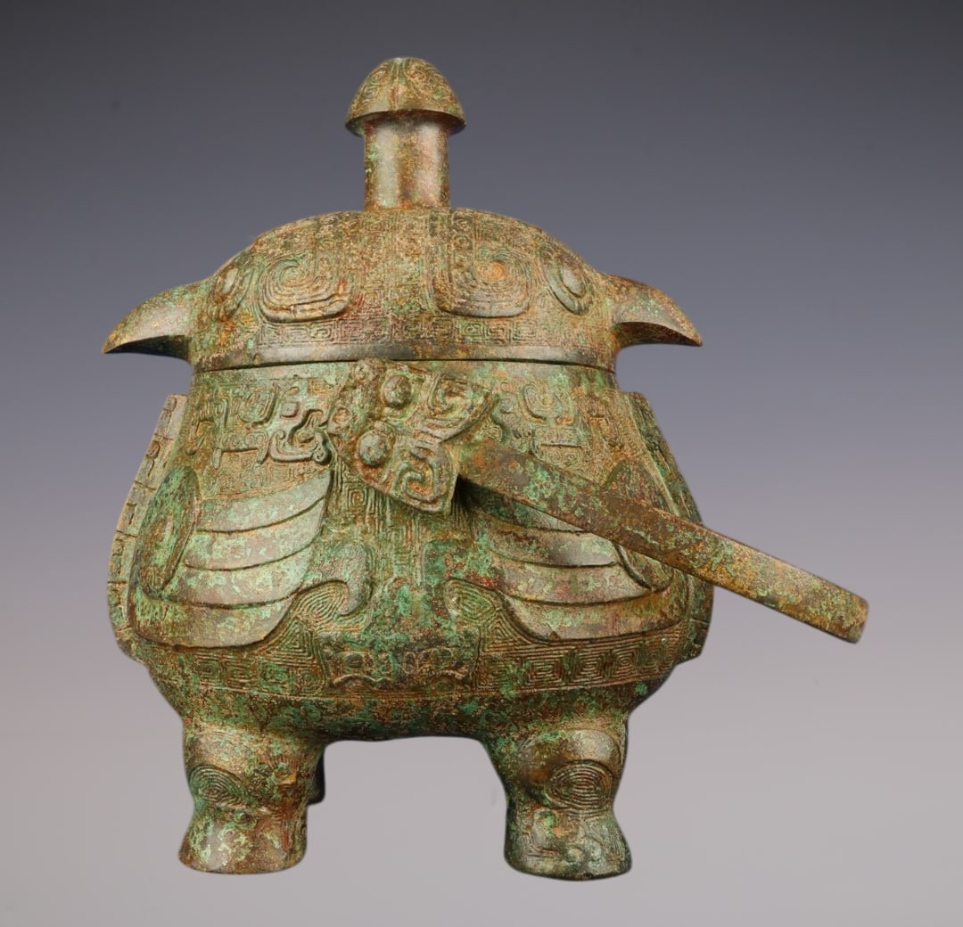 An Archaic Bronze Bird-Shaped Beast-Ears Loop-Handled Pot: An Archaic Bronze Bird-Shaped Beast-Ears Loop-Handled Pot,W.Zhou , China,Size:8.7inx11in,Weight:2400g青铜鸟形兽耳提梁壶,中国西&#
