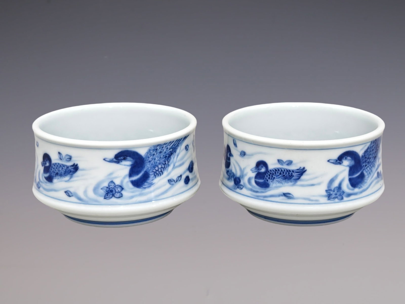 A Pair of Exquisite Blue and White Mandarin Duck Pattern Cups: A Pair of Exquisite Blue and White Mandarin Duck Pattern Cups,Qing Dynasty, China,Yongzheng Six-character