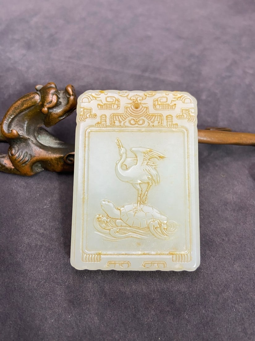 An Exquisite White Jade Turtle Crane Pattern Pendant: An Exquisite White Jade Turtle Crane Pattern Pendant,Qing Dynasty,China,Size:2.4inx1.7inx0.3in,Weight:50g白玉龟鹤纹挂件,中国清代,Size:
