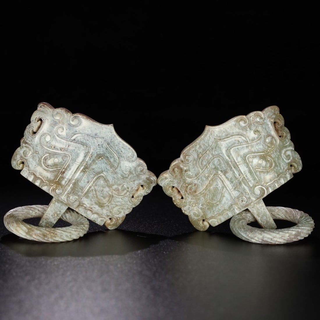 A pair of Exquisite Hotan Jade Ornament: A pair of Exquisite Hotan Jade Ornament,Han Dynasty, China,Size:3.1inx2.8inx0.7in,Weight:168.5g 一对和田玉摆件,中国汉代