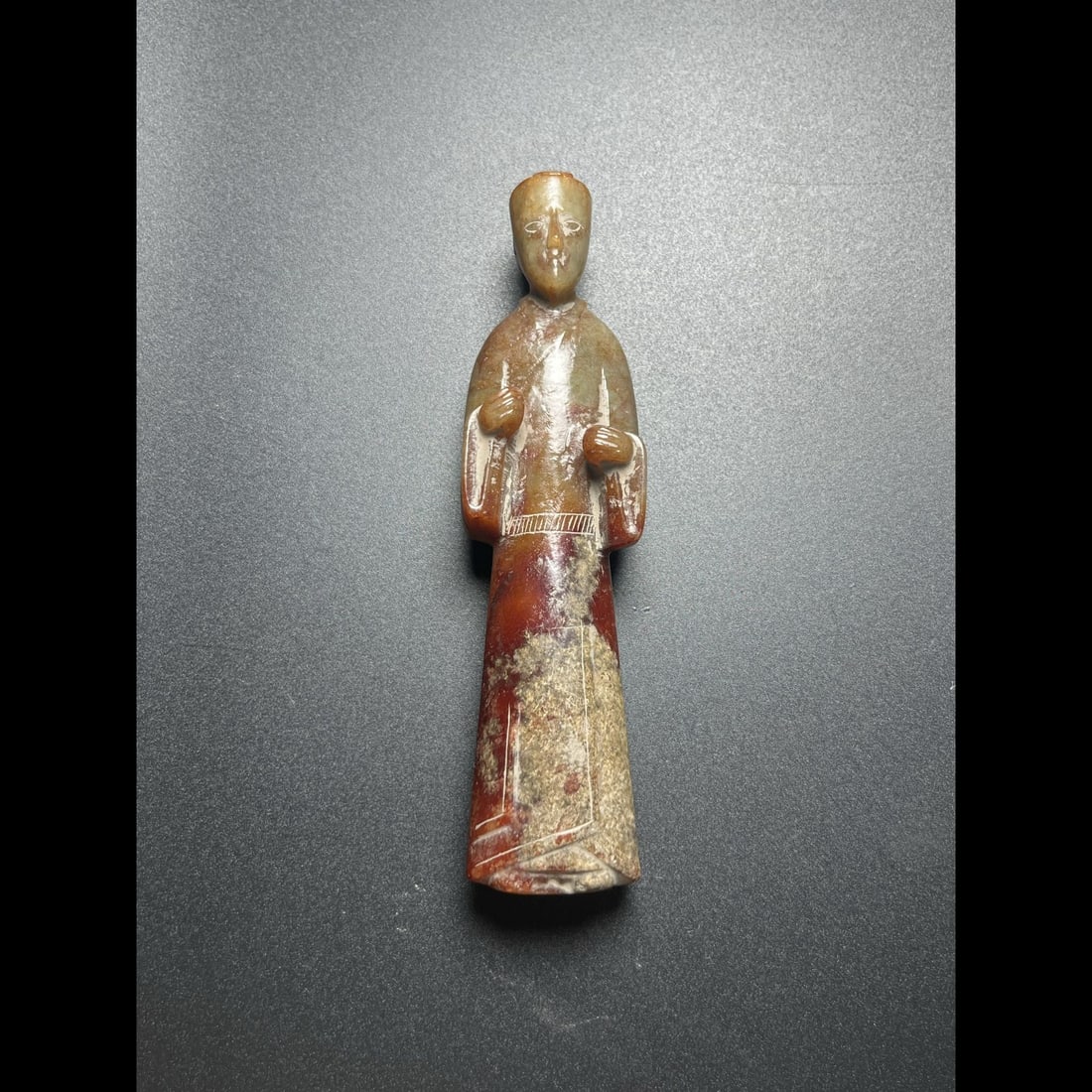 An Exquisite Hotan Jade Human Figure: An Exquisite Hotan Jade Human Figure,Han Dynasty, China,Size:5.5inx1.4inx0.9in,Weight:153g 和田玉人,中国汉代