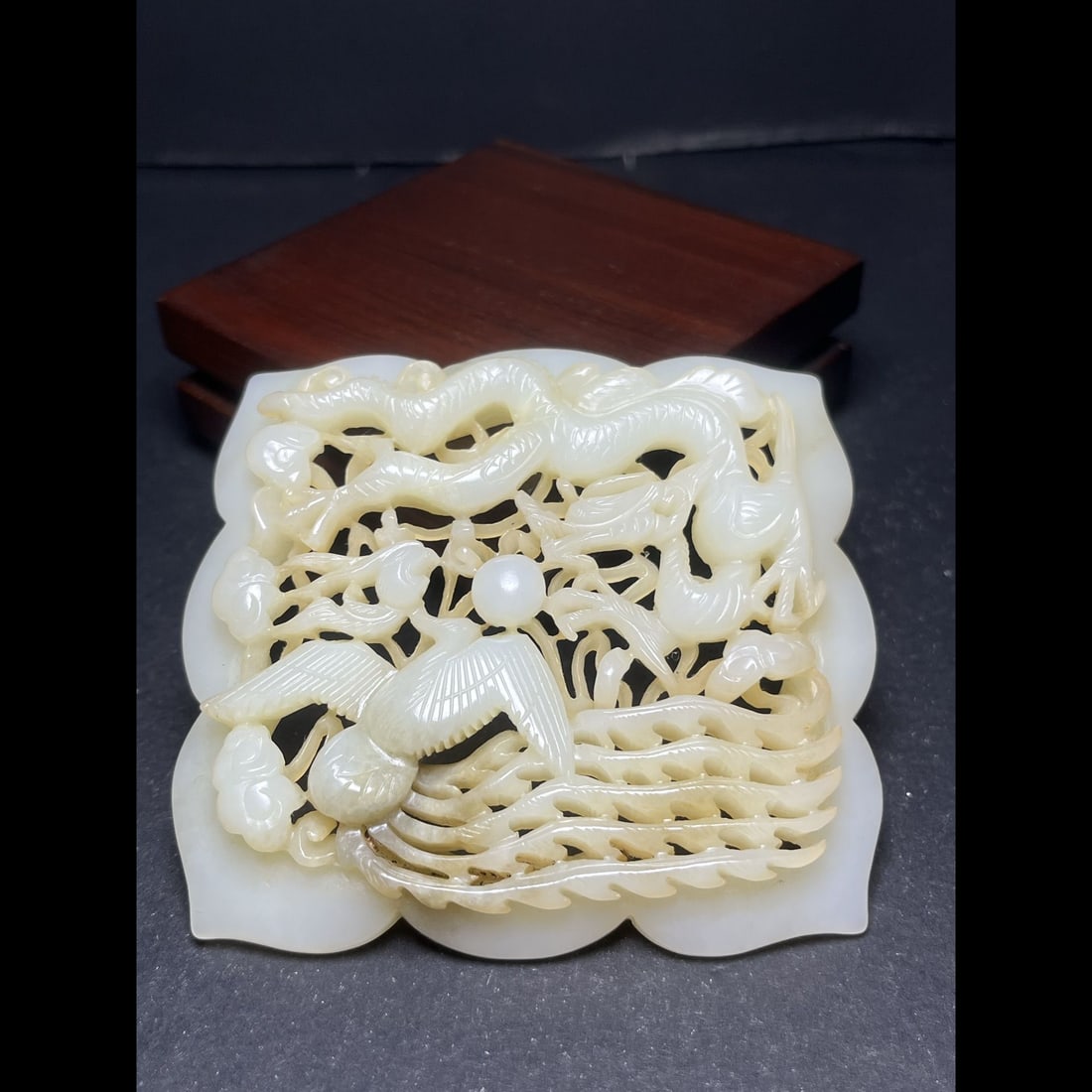 An Exquisite Hotan Jade Dragon and Phoenix Pattern Tile Pendant: An Exquisite Hotan Jade Dragon and Phoenix Pattern Tile Pendant,Qing Dynasty, China,Size:3.3inx0.5inx3.1in,Weight:84g 和田玉龙凤纹瓦子,中国&