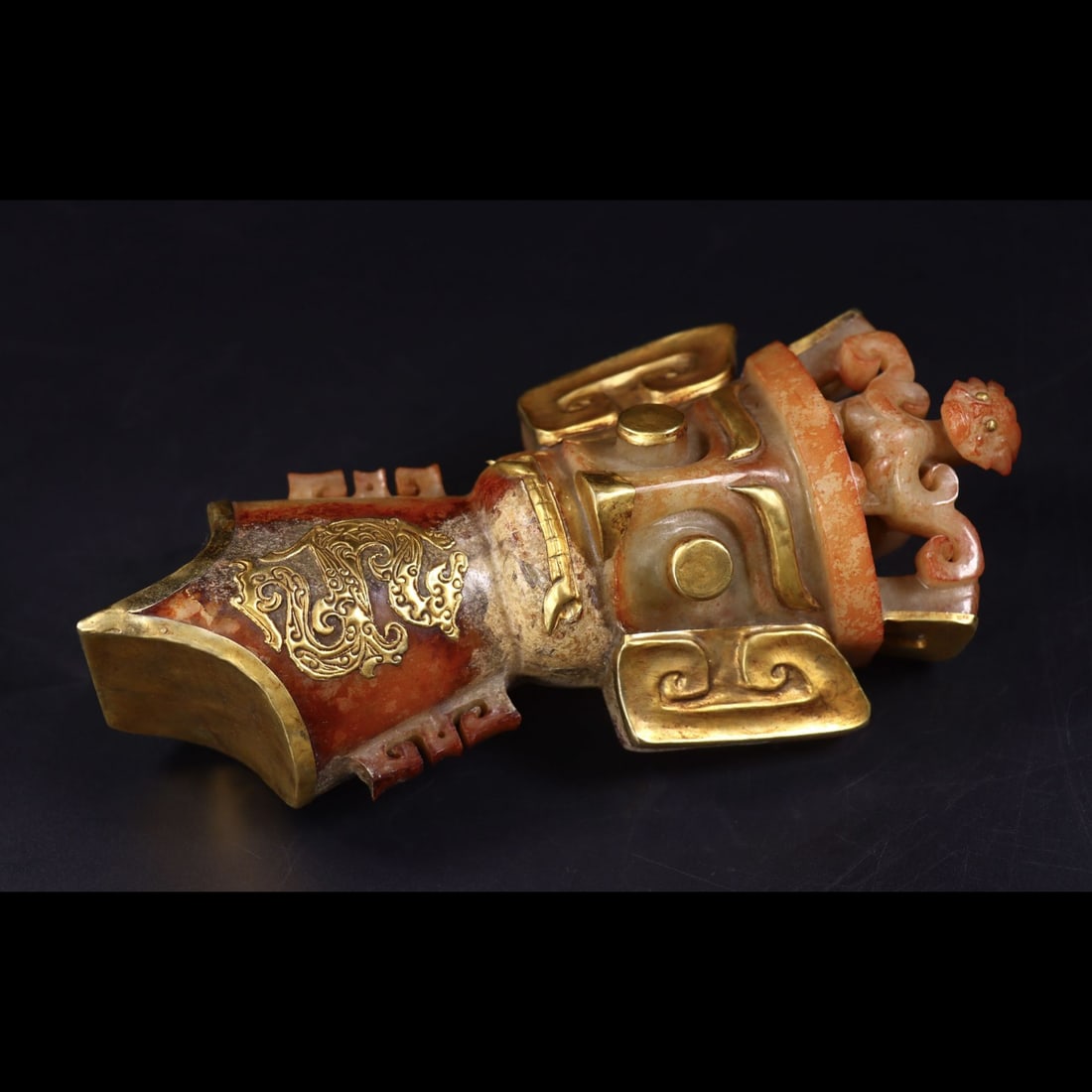 An Exquisite Hotan Jade Gold-Clad Mask: An Exquisite Hotan Jade Gold-Clad Mask,Ancient Period,Size:3.1inx8.7inx3.9in,Weight:1606g 和田玉包金面具,远古时期