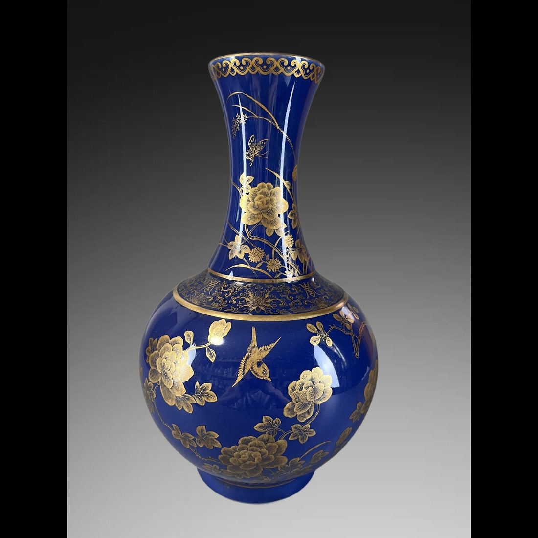 An Exquisite Ji Blue Glazed Painted Gold Flower and Bird Pattern Vase: An Exquisite Ji Blue Glazed Painted Gold Flower and Bird Pattern Vase,Qing Dynasty, China,Guangxu Six-character Mark,Size:15.2in 霁蓝釉描金花鸟纹瓶
