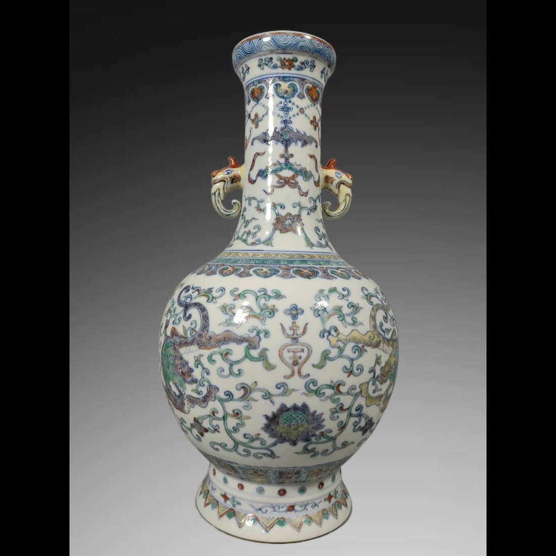 An Exquisite Doucai Dragon Pattern Double-Ears Vase: An Exquisite Doucai Dragon Pattern Double-Ears Vase,Qing Dynasty, China,Qianlong Six-character Mark,Size:11.6inx6.1in