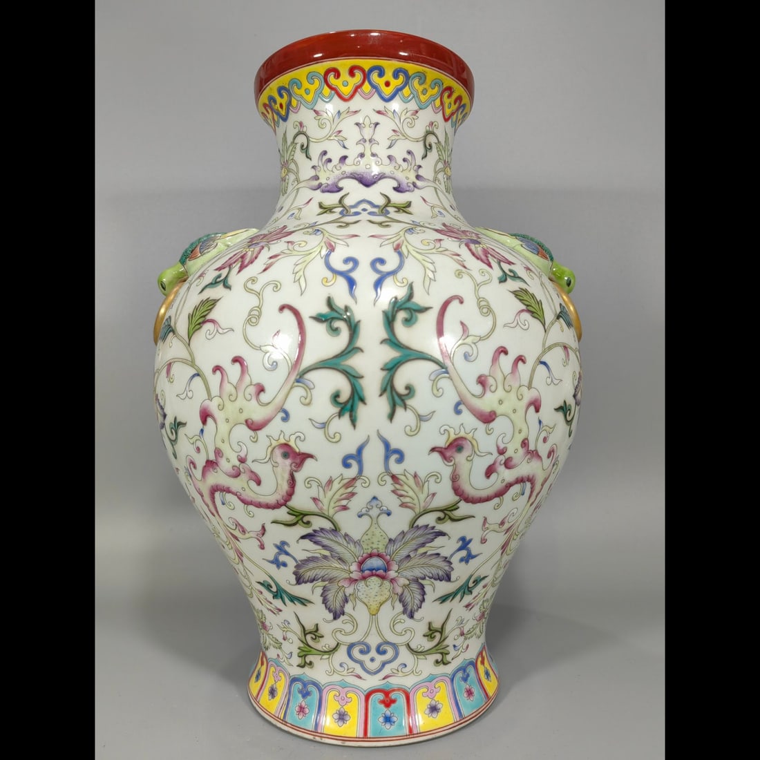 An Exquisite Enamel Lotus and Phoenix Pattern Double-Ears Vase: An Exquisite Enamel Lotus and Phoenix Pattern Double-Ears Vase,Qing Dynasty, China,Qianlong Six-character Mark,Size:14.2inx10.6in