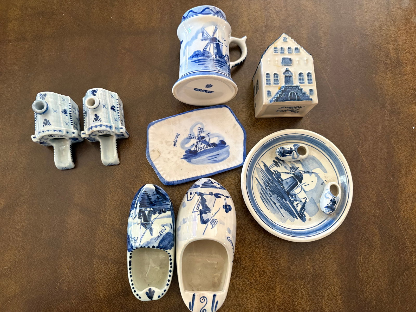 Lot of 8 Blue Delft Figurines: Lot of 8. Included are 2 House Ashtrays, Windmill house, Clogs. In excellent condition. **Please contact us by email ONLY at communityes@yahoo.com if you require shipping and would like a quote prior