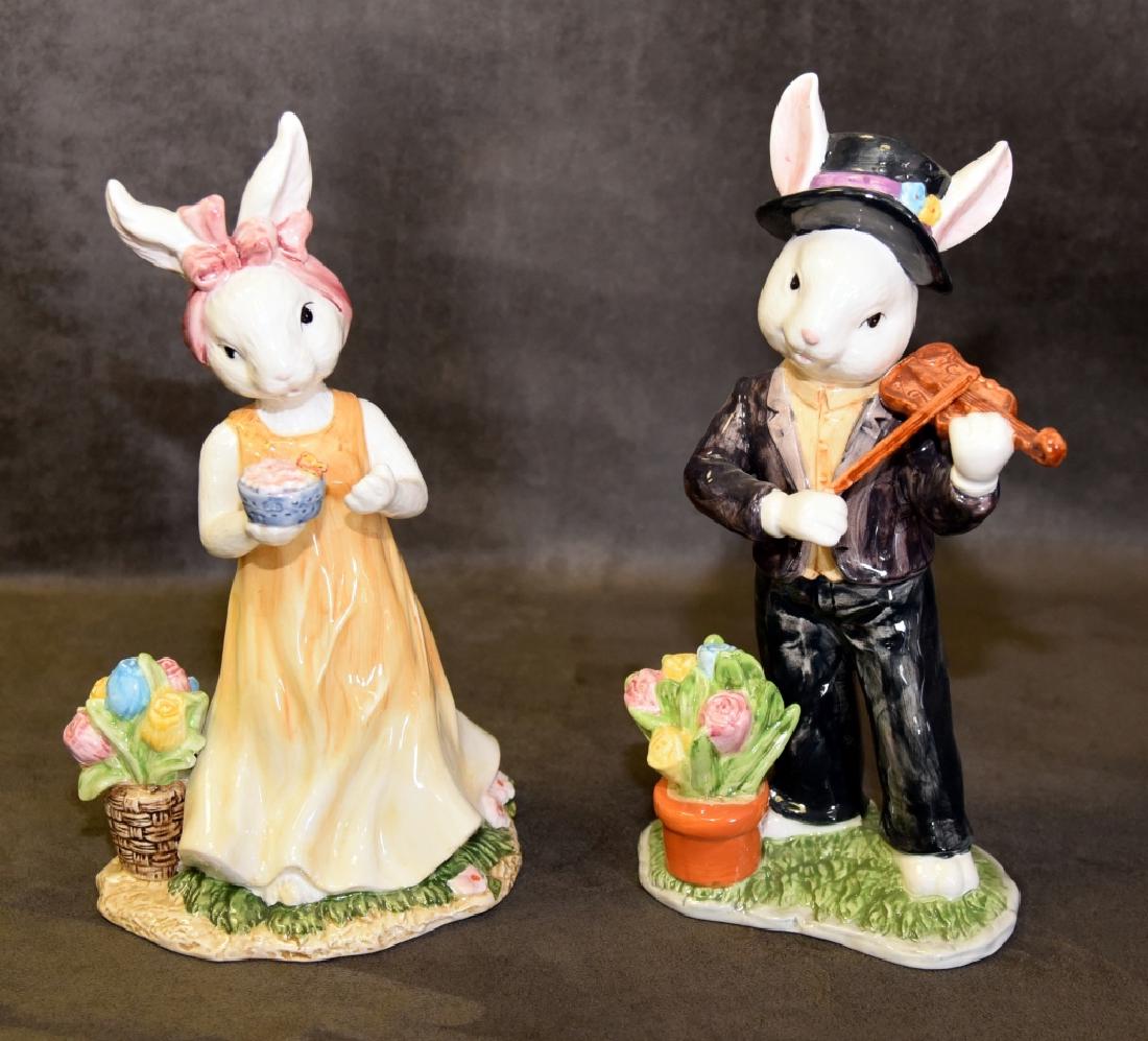 Male & Female Rabbit Figurines: Both w/flowers, male w/violin, approximately 11.5" tall.