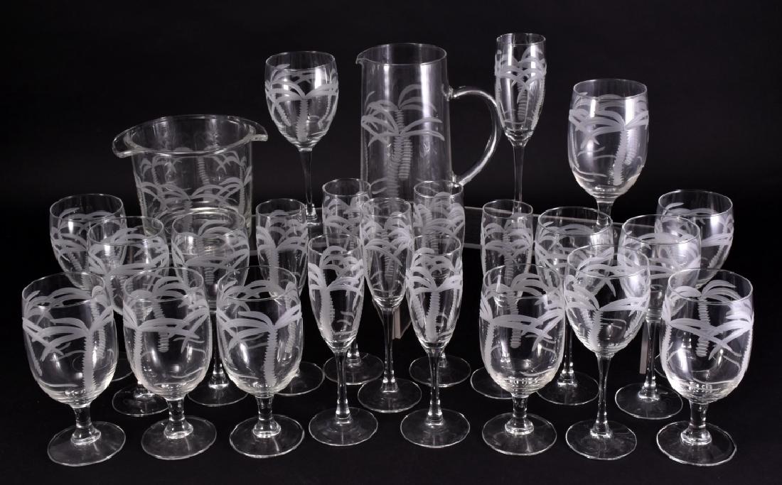 24 Pieces Rolf Glass Palm Tree Glassware: 8" high pitcher, 5" high ice bucket, 8 wine stems, 8 champagne flutes (four 8 1/8" tall, four 8.75" tall) and 6 waters.