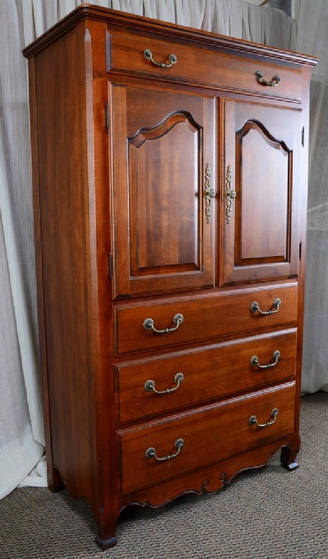 Ethan Allen Armoire: Long drawer over 2 doors over bank of long drawers, 38" wide x 19" deep x 64" high.