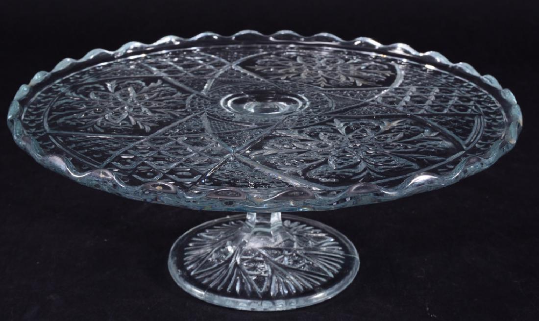 Rosette w/Pinwheels Cake Stand: Indiana Glass Co., 1905, 9.5" diameter x 3.75" high.