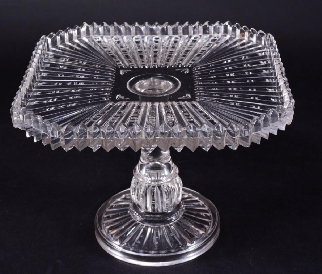 Nellie EAPG Cake Stand: McKee, 1882, 9" square x 7" high.