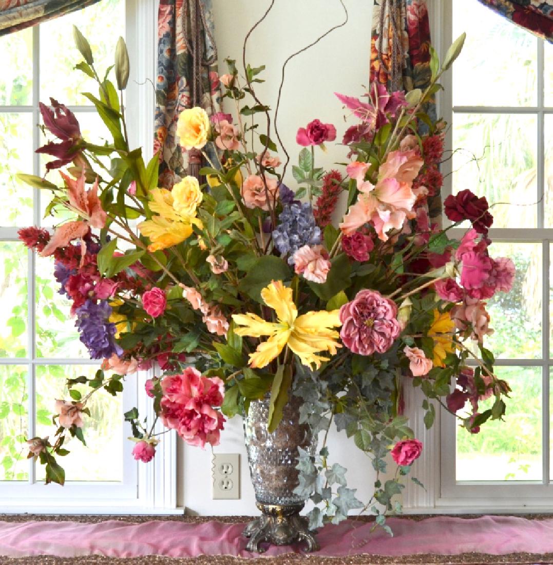 Large Impressive Floral Arrangement: Vase on metal 13.5" high, overall 34" wide x 36" high.