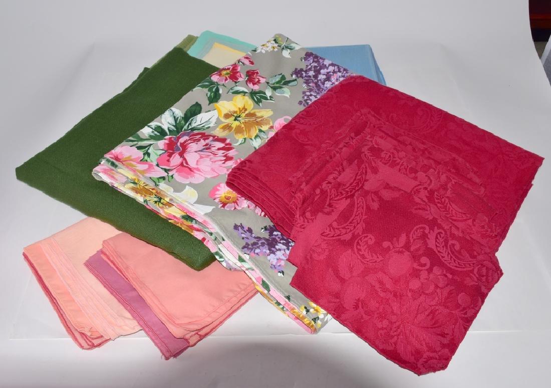 Three Colorful Tablecloths & Napkins: Floral 68" x 82" cloth w/large assortment of colorful napkins, burgundy cloth 56" x 110" w/8 napkins and green cloth 60" x 118".