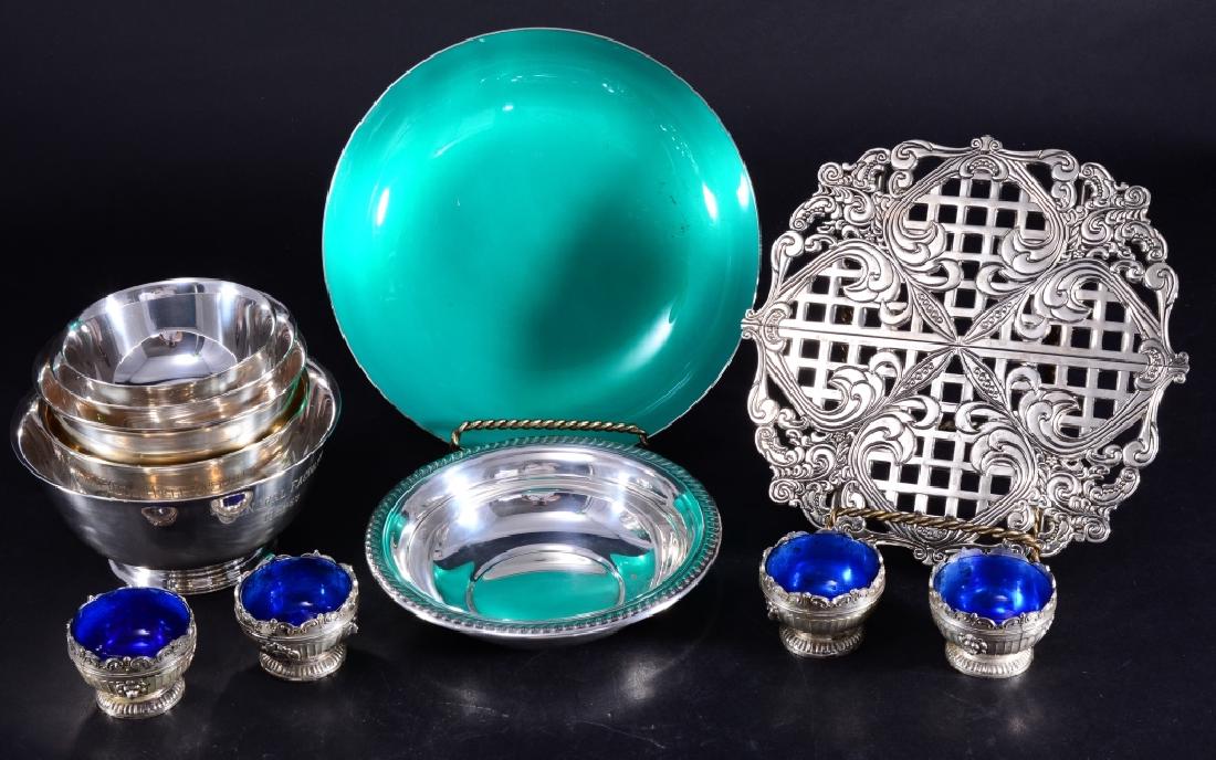 Sterling & Plated Bowls, Blue Lined Salts & Trivet: Sterling Gorham Revere 8 troy oz. bowl 5" D x 2 7/8" H, Reed & Barton 8.75" D green lined bowl, 4 graduated plated bowls (2 Gorham, 1 Oneida, 1 unmarked), Rogers dish, 4 blue lined silver tone salts &