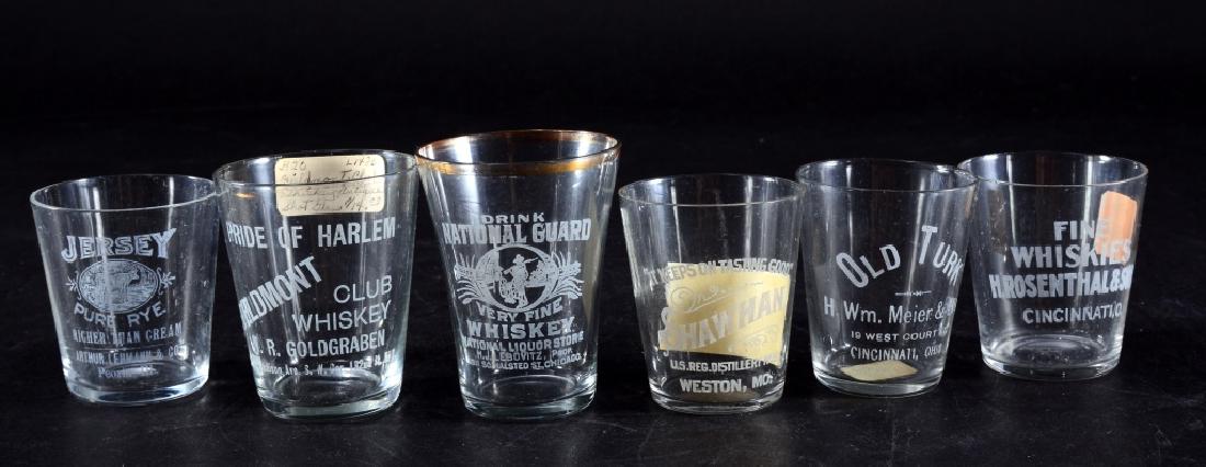 6 Vintage Advertising Shot Glasses: Rosenthal Fine Whiskies, Jersey Pure Rye, Old Turk, Shawhan, Pride of Harlem Fieldmont and tallest 2.75" high National Guard w/gold edge and some wear.