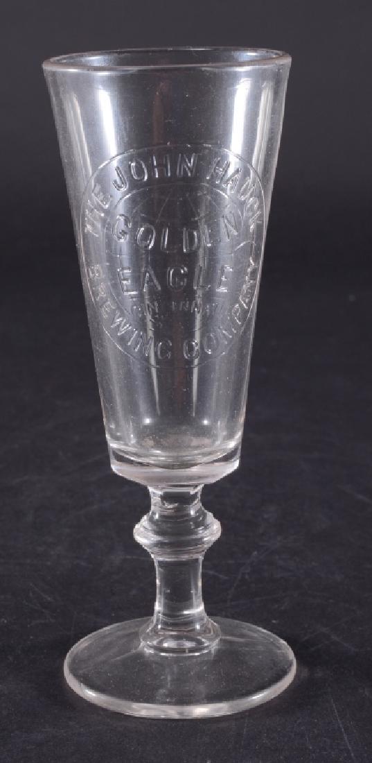 Vintage John Hauck Brewing Co. Advertising Glass: Golden eagle over globe, Cincinnati, 7" high.