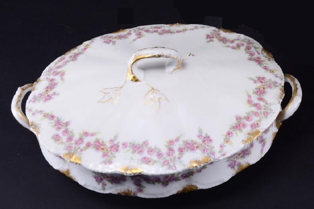 Imperial Limoges Oval Covered Casserole w/Roses: Trailing leaves at finial, double handled, interior decoration, 11.75" handle to handle.