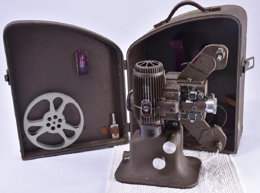 Vintage Bell & Howell Film Diplomat Projector: 16MM Film Projector in case, Design 173 Model A., projector 14 1/2" t x 6 3/4" w @ base, case 16" t x 8 1/4" w.