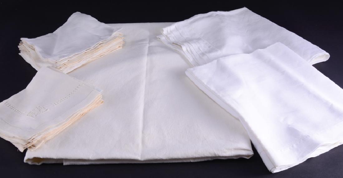 Large Linen Tablecloth, 2 tablecloths & Napkins: Large linen tablecloth120" x 66", 59 12" x 69 1/2" cloth and 52" x 52 1/4" cloth together w/15 napkins in 2 patterns.