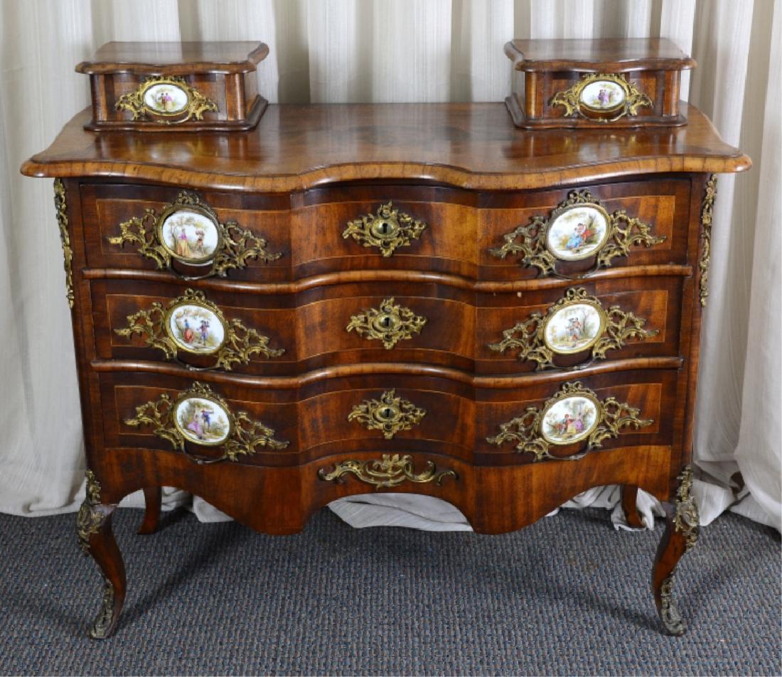 French Style Ornate Chest w/Painted Porcelains: 5-drawer chest w/glove boxes having serpentine drawers and case and boxes, burl wood, stringing, brass ornate hardware & ormolu, 41 1/2" wide x 17 1/2" deep x 37 1/2" high.
