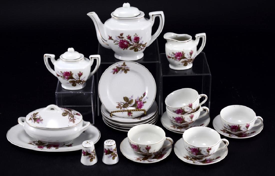 Moss Rose Children's Tea Set: 5 cups, 5 saucers, 4 plates 4 1/2" D, creamer, covered sugar, 5 1/2" oval covered casserole, 7 1/4" oval platter, salt & pepper & 4 1/2" tall teapot.