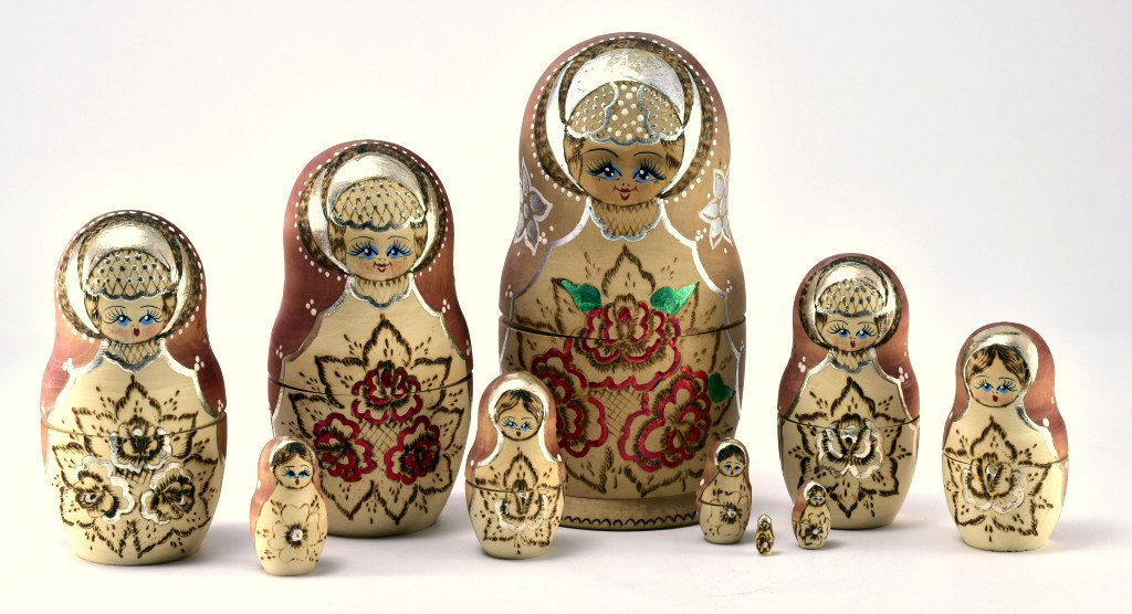 10 Russian Nesting Dolls: Largest 8 1/2" tall.