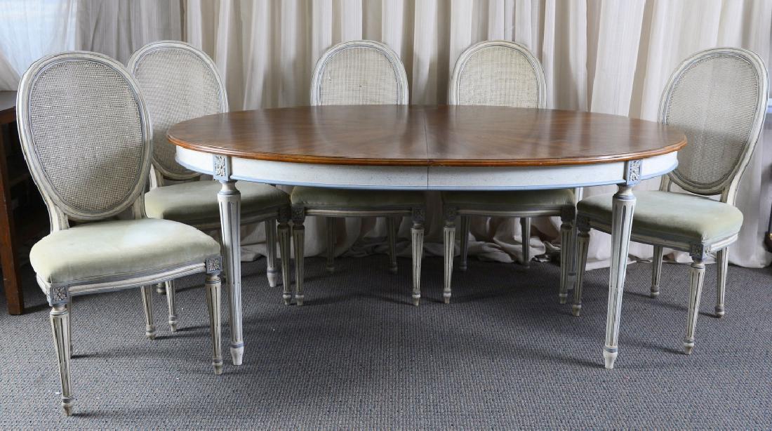 Widdicomb Louis XVI Style Dinning Table & 6 Chairs: John WIddicomb Co. painted table w/stop fluted legs, 29" high x 70 1/4" wide x 43 3/4" deep, three 18" leaves w/painted aprons, dining chairs, 39" center back height, one chair wo/cane, one w/cane run