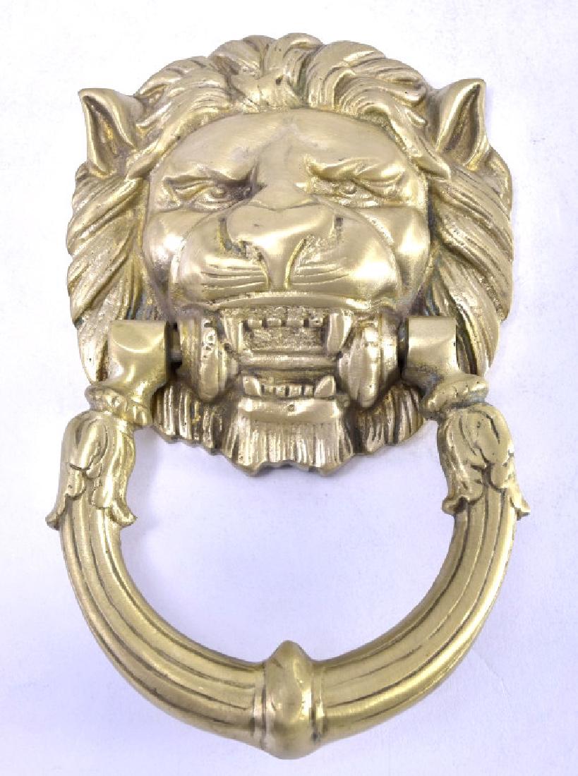 Brass Lion Door Knocker: Greece, 4 1/4" wide x 6 3/4" long.