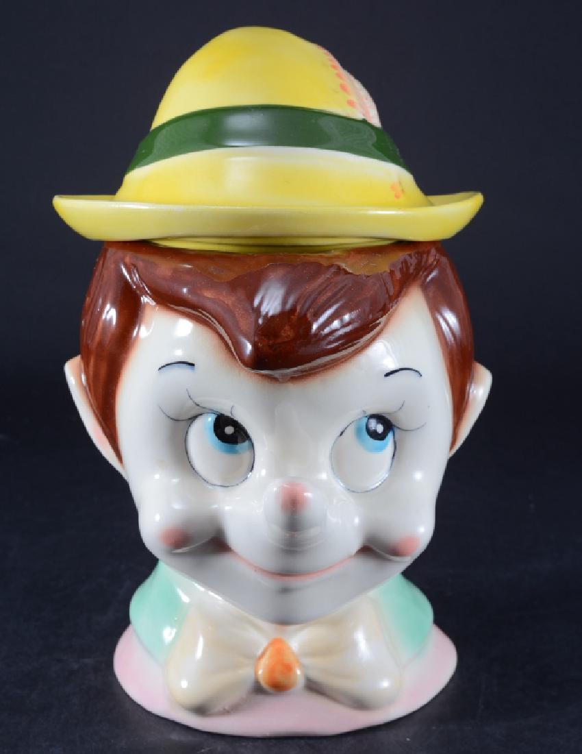 Smiling Pinocchio Cookie Jar w/Tyrolean Hat: 11" high.