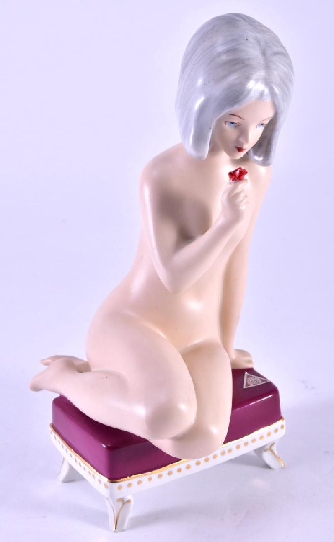 Royal Dux Seated Nude w/Flower: Designed by Cernoch, 9.5" high.