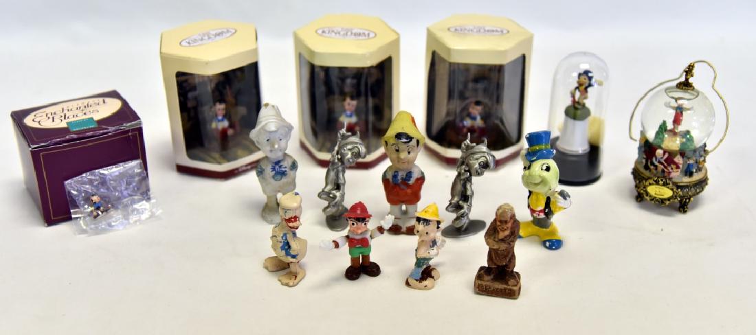 15 Miniature Pinocchios: Vintage & mint in box, various materials inc. pewter figures, snow globe, thimble, 3 boxed Tiny Kingdoms & one boxed Enchanted Places.