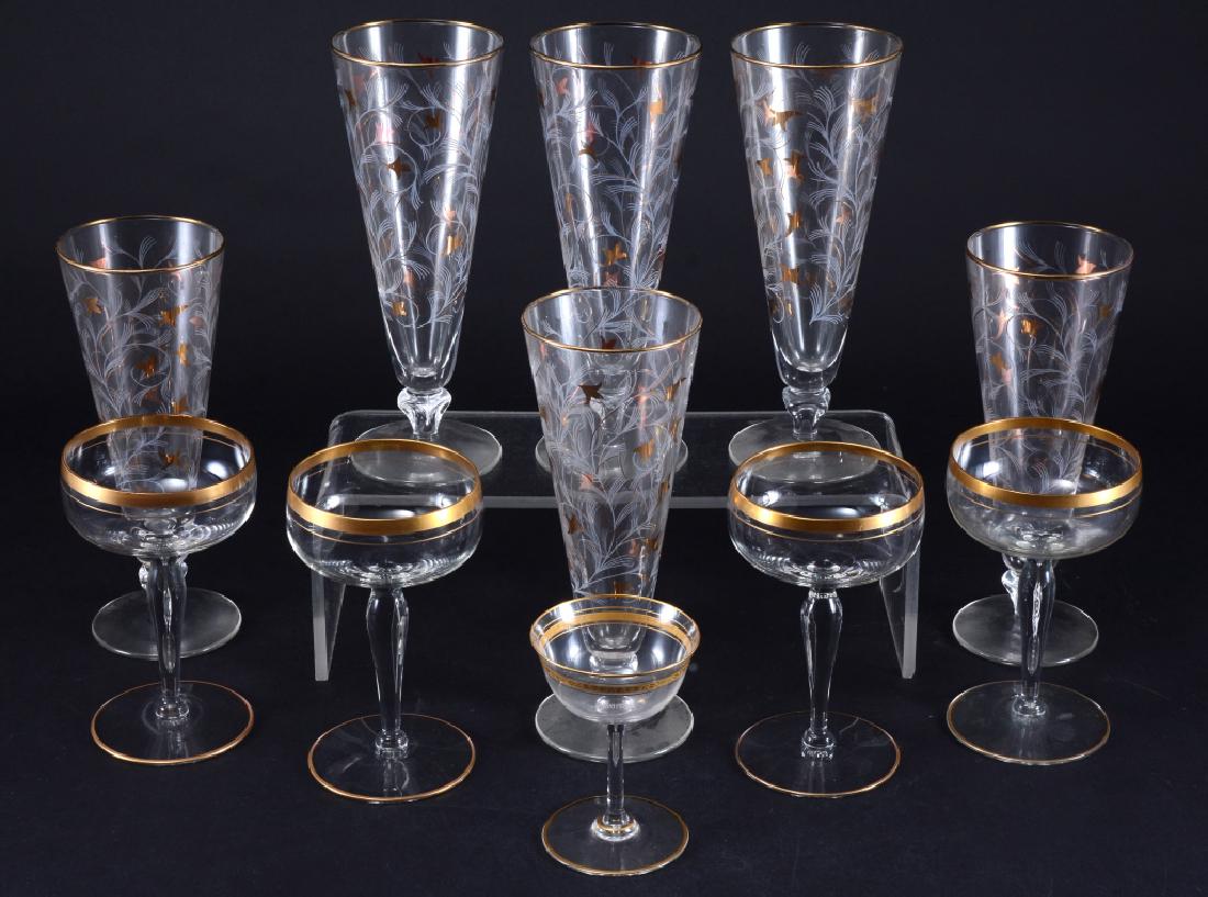 Gold Trim Glassware: 5 etched pilsners w/gold flowers, 4 gold rim champagne glasses and one 4" tall gold rim & band liquor stem.