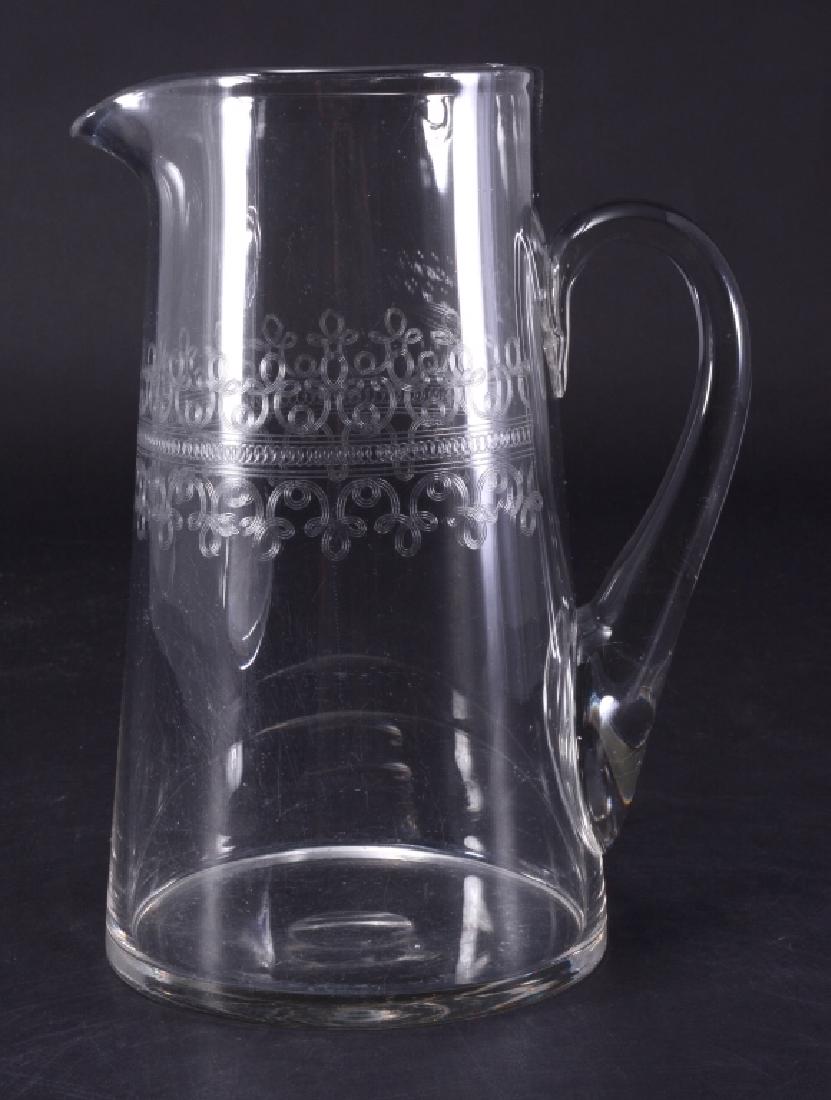 Hand Blown Pitcher: 8.75" high.