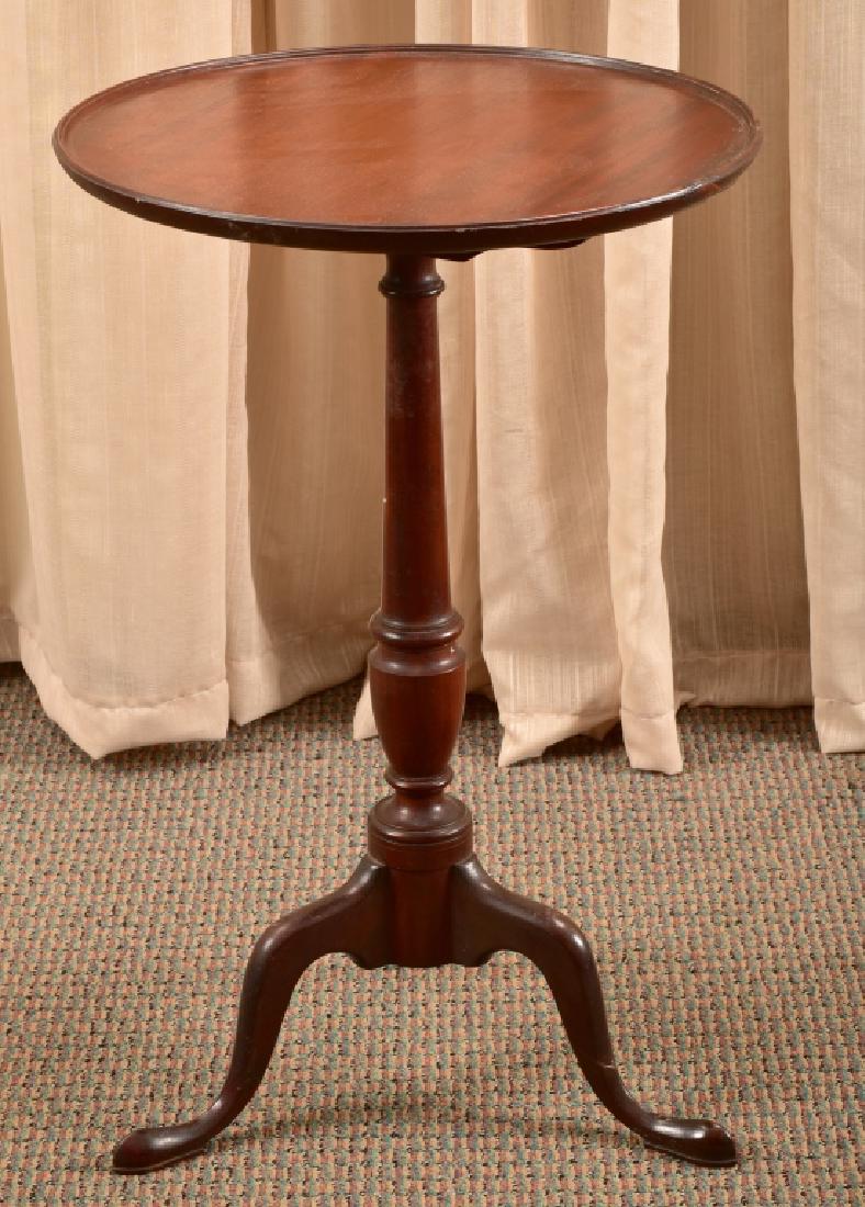 Mahogany Tilt Top Table: Dish top, snake foot, locking mechanism, 27.25" tall x 17 5/8" diameter.