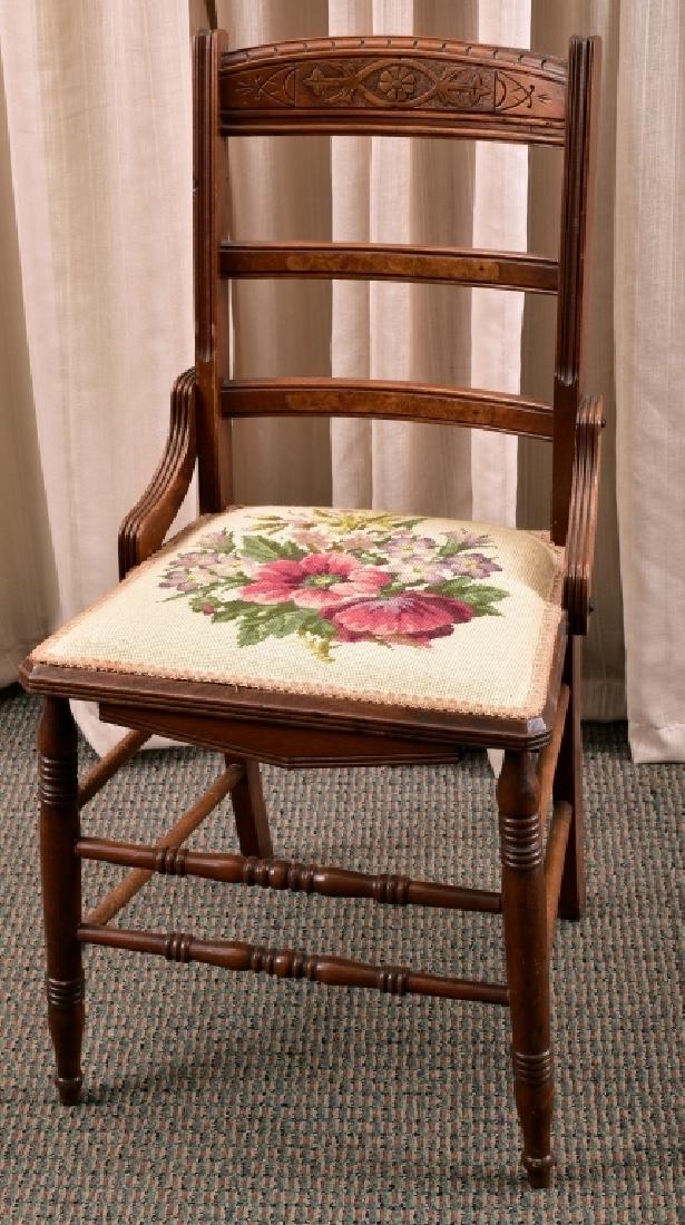 Victorian Eastlake Side Chair: Needlepoint seat, turned front leg & front stretchers, 35" center back height.