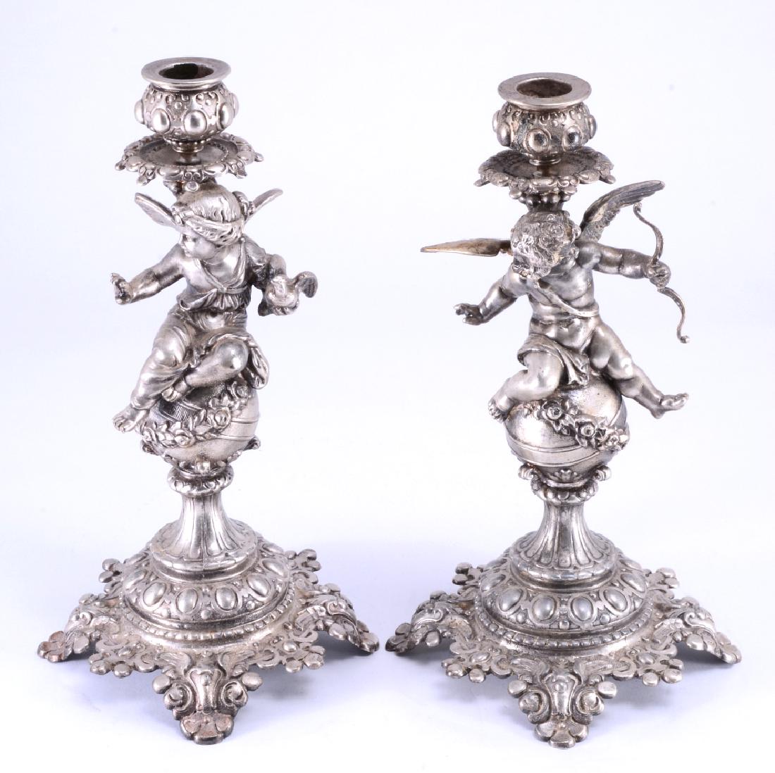 Pair of Silvered Cherub & Cupid Candlesticks (1 of 5)