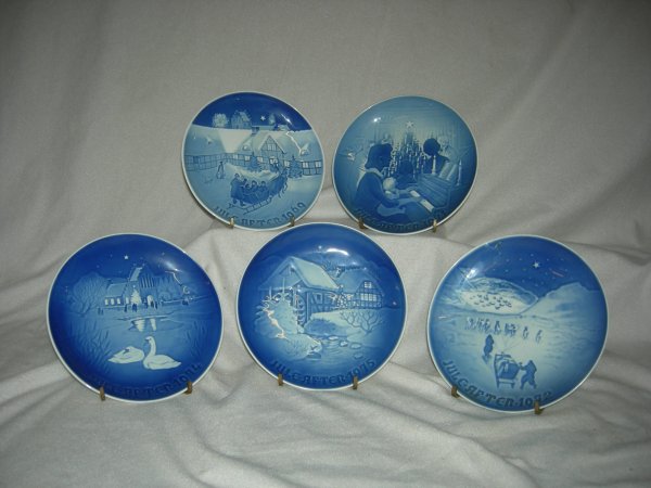 B&G Christmas Plates: 5 Bing & Grondahl Copenhagen Porcelain Christmas Plates, 7.25" Diameter. Including 1969 Arrival of Christmas Guests, 1971 Christmas at Home, 1974 Christmas In the Village, 1975 Christmas at the Old Wa