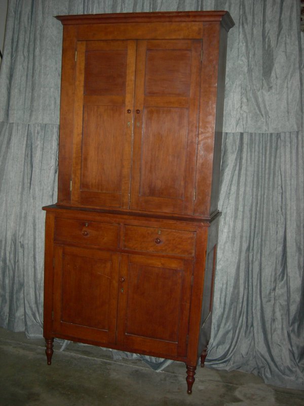 19th Century Southern Antique Linen Press: Tall 19th Century Southern Two Piece Antique Cherry Step-Back Linen Press, Top w/Two Panel Doors Opening to 3 Shelves, Base w/Two Dovetailed Drawers Over Two Doors Opening to One Shelf, Raised on 4 Tu