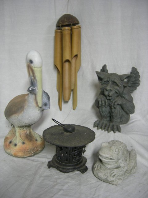 YARD DÉCOR ITEMS: Yard Decorative Items Including Composite Gargoyle, Cement Frog and Pelican, Cast Iron Oriental Lantern, and Bamboo Chimes. Height Ranges From 7" to 35".