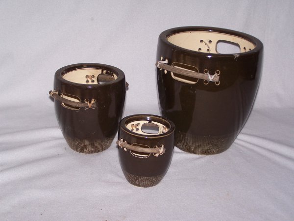TRIO EARTHENWARE PLANTERS: 3 Graduated Sizes Earthenware Planters w/Wood Handle Decoration; 5"T, 7"T, 10"T.