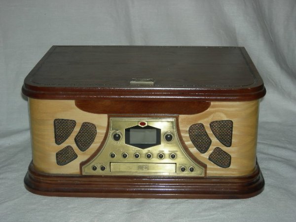 SPIRIT OF ST. LOUIS RADIO/CD/RECORD PLAYER: Two Tone Spirit of St. Louis Tabletop Radio/CD/Record Player.