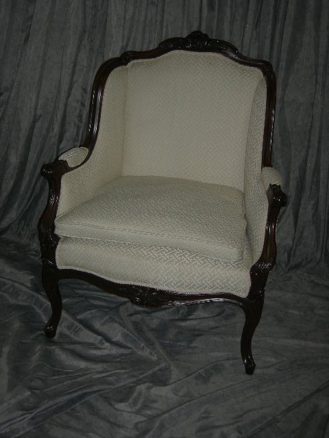 FURNITURE: Bergere Chair Upholstered In Creamy Matelasse, Carved Walnut Crest, Apron & Arms, Cabriole Legs, 39.5"T.