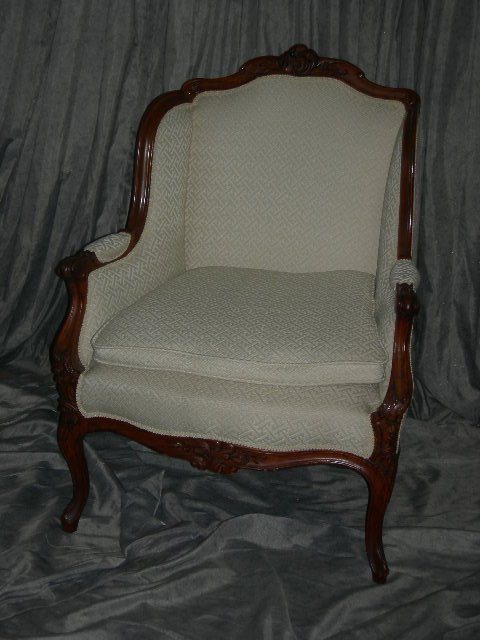 FURNITURE: Bergere Upholstered In Creamy Matelasse, Carved Walnut Crest, Apron & Arms, Cabriole Legs, Lighter Wood Stain Than Its Mate #62, 39.5"T.