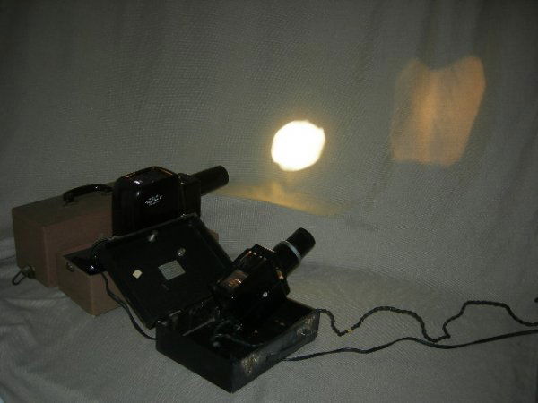 PHOTOGRAPHY: 2 Vintage Kodak Projectors Inc Koda Slide Model 1 & Model A In Storage Cases.